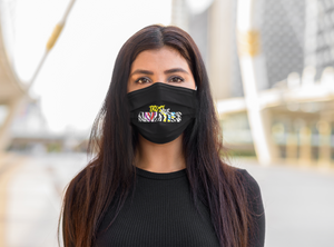 Woman wearing a black Trust Your Abilities face mask