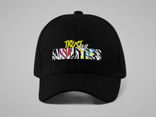 Load image into Gallery viewer, Black hat with multi-colored Trust Your Abilities lettering on the front
